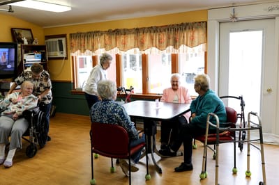 Residents enjoying conversation in a common area