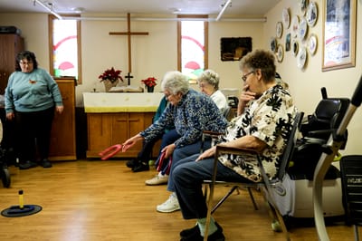 Residents engaging in a group activity in a common area