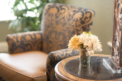 Cozy interior corner with floral arrangement