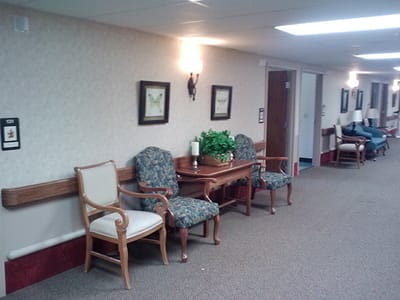 Common area with seating and wall decor