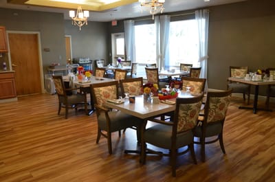 Dining room with tables set for meals