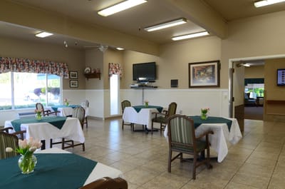 Dining area with tables and flowers