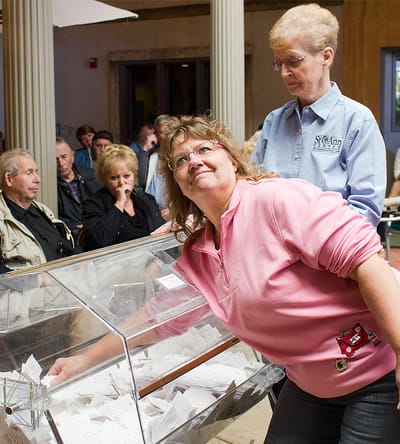 Residents participating in an activity with a raffle draw