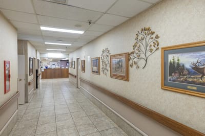 Interior hallway with artwork on the walls