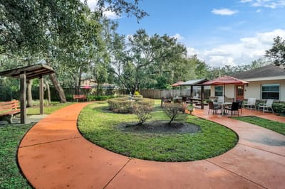 Outdoor garden area with pathways and seating