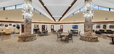 Interior view of a common area with seating and tables