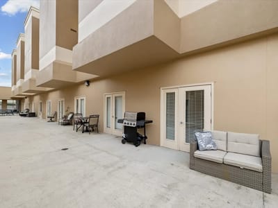 Outdoor seating area with grill at a senior living facility