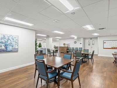 Interior common area with tables and chairs