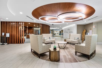 A well-decorated common area in The Cascades at Delray