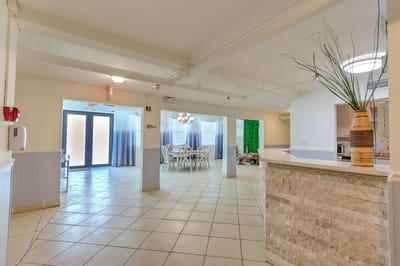 Bright, spacious common area with seating and decor