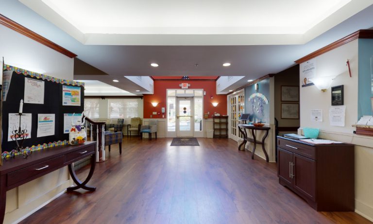 Interior lobby area with seating and reception desk