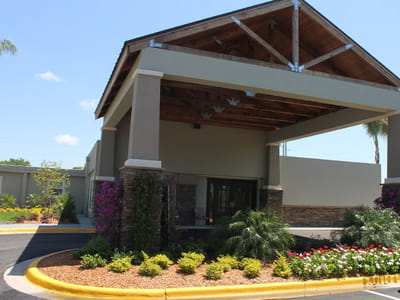 Exterior view of the facility entrance with landscaping