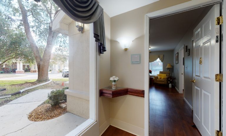Sunny entrance with an inviting sitting area