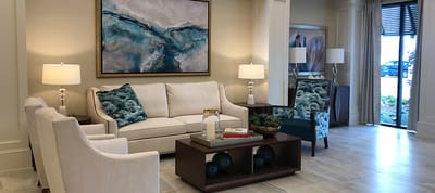 Comfortable common area with seating and artwork