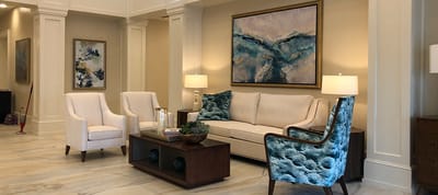 Bright lobby area with seating and artwork