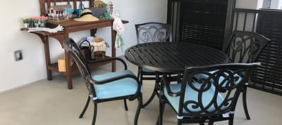 Cozy outdoor seating area with a table and chairs