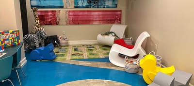 Brightly colored play area with toys and decor