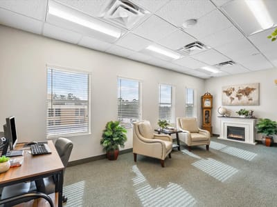 Bright common area with comfortable seating and decor