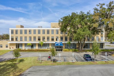 Exterior view of The Grande Senior Living facility