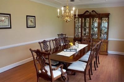 Elegant dining room with a large table and chandelier