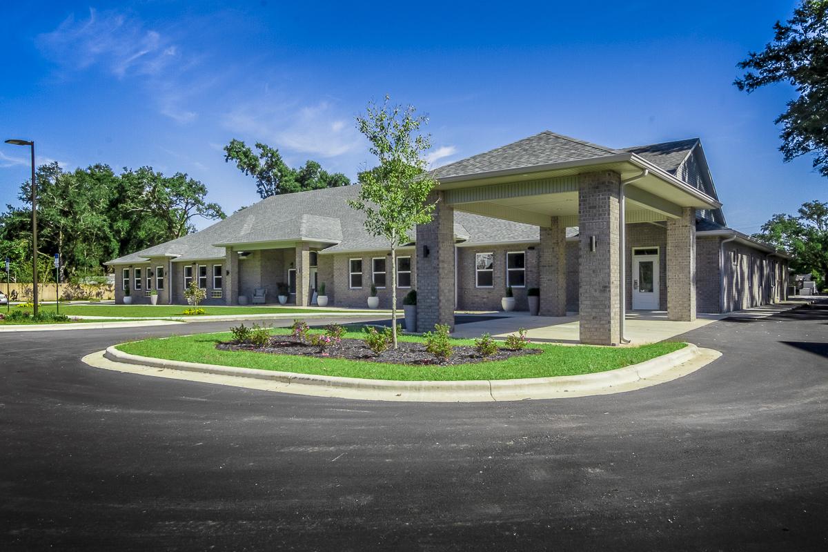 Exterior view of Shelton Manor with garden landscaping