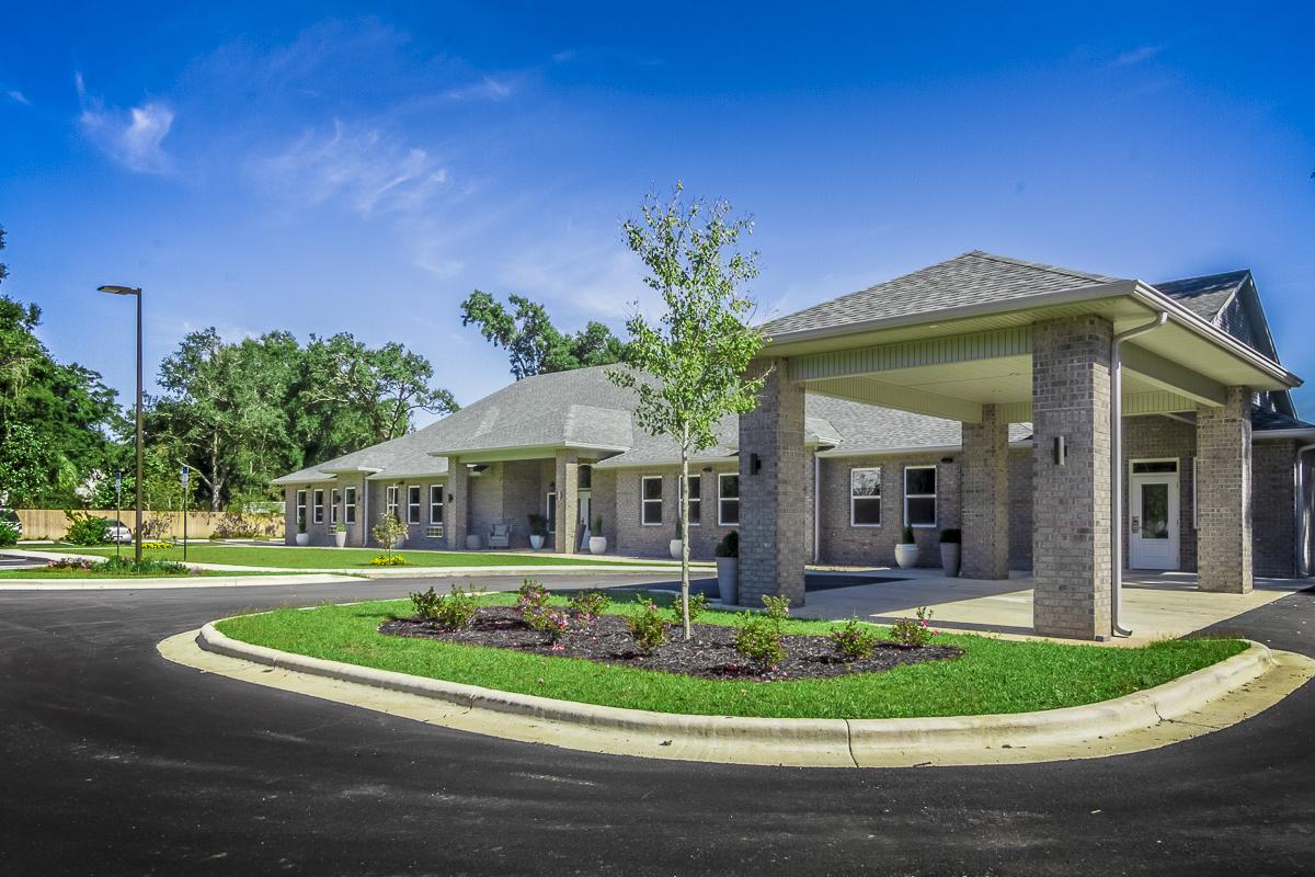 Exterior view of Shelton Manor Inc with landscaping