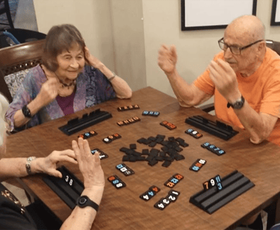 Residents engaged in a game in the common area