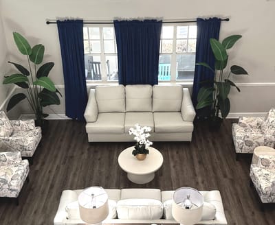 Bright common area with seating and décor