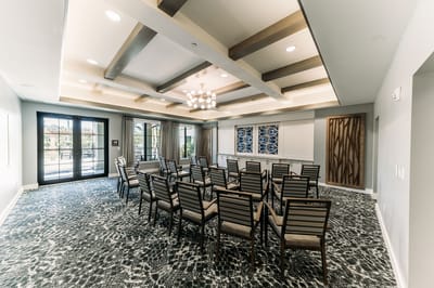 Bright common area with seating for activities