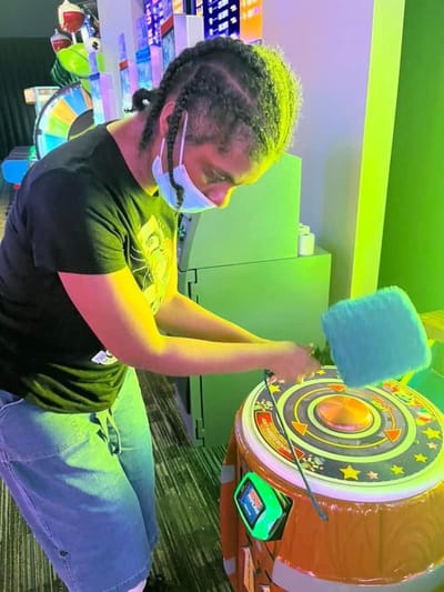 Jonesboro Adult Health & Day Support, Nursing Home — Person playing a carnival-style arcade game
