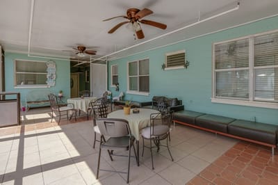 Outdoor patio area with tables and seating
