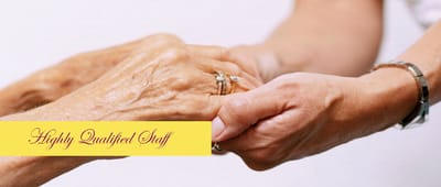 Two hands clasped, symbolizing care and support