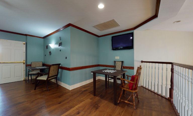 Cozy common area with seating and a television