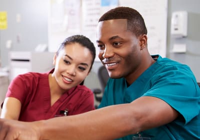 Sarah Adult Day Services, nursing home — Healthcare professionals collaborating in a care environment