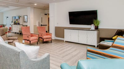 Common area with seating and television