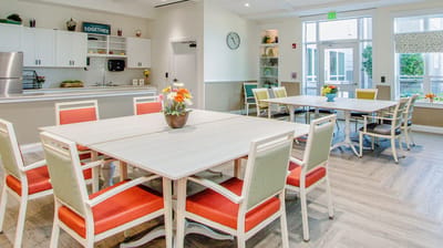Interior common area with tables and chairs