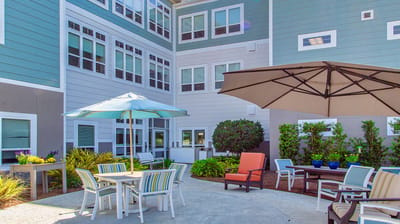 Patio area with seating and umbrellas