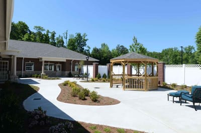 Outdoor courtyard with gazebo and landscaping