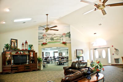 Spacious common area with dining section and decor