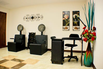Salon area with styling chairs and decorative elements