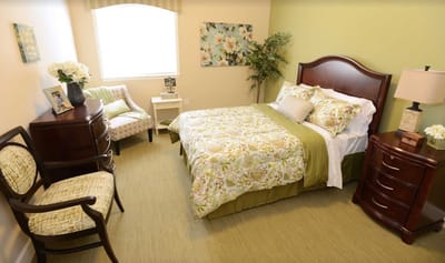 Well-decorated private resident room with furniture