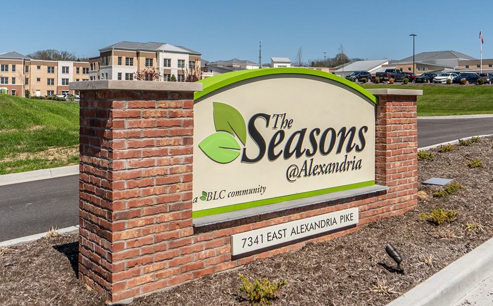 Facility sign with name and address at entrance