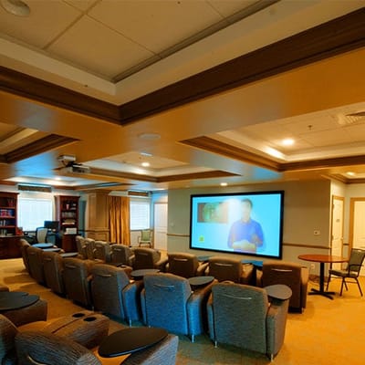 Common area with seating and media screen