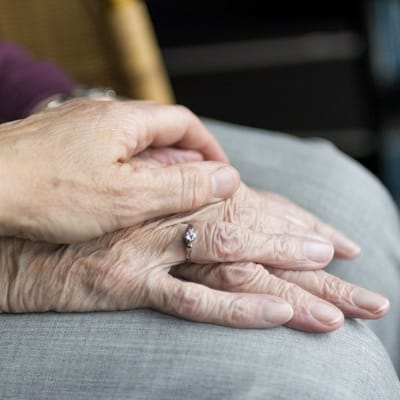 Nurse Care of Buckhead, Nursing Home in Atlanta, GA — Two pairs of hands resting together