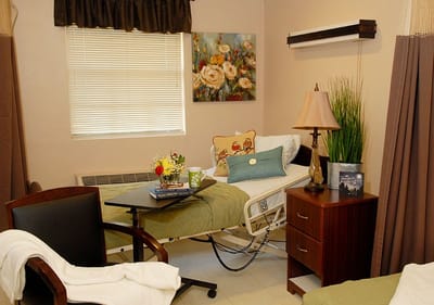 Cozy resident room with bed and decor