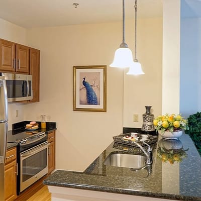 Bright kitchen area with modern appliances and décor