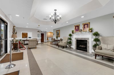 Interior view of a warm common area with seating