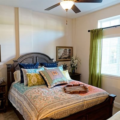 Cozy private resident room with bedding and decor
