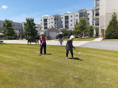 Residents enjoying croquet on the lawn