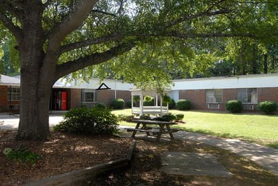 Outdoor garden area with gazebo beside the building